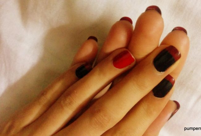french accent louboutin nail trends in red and black on pumpernickel pixie